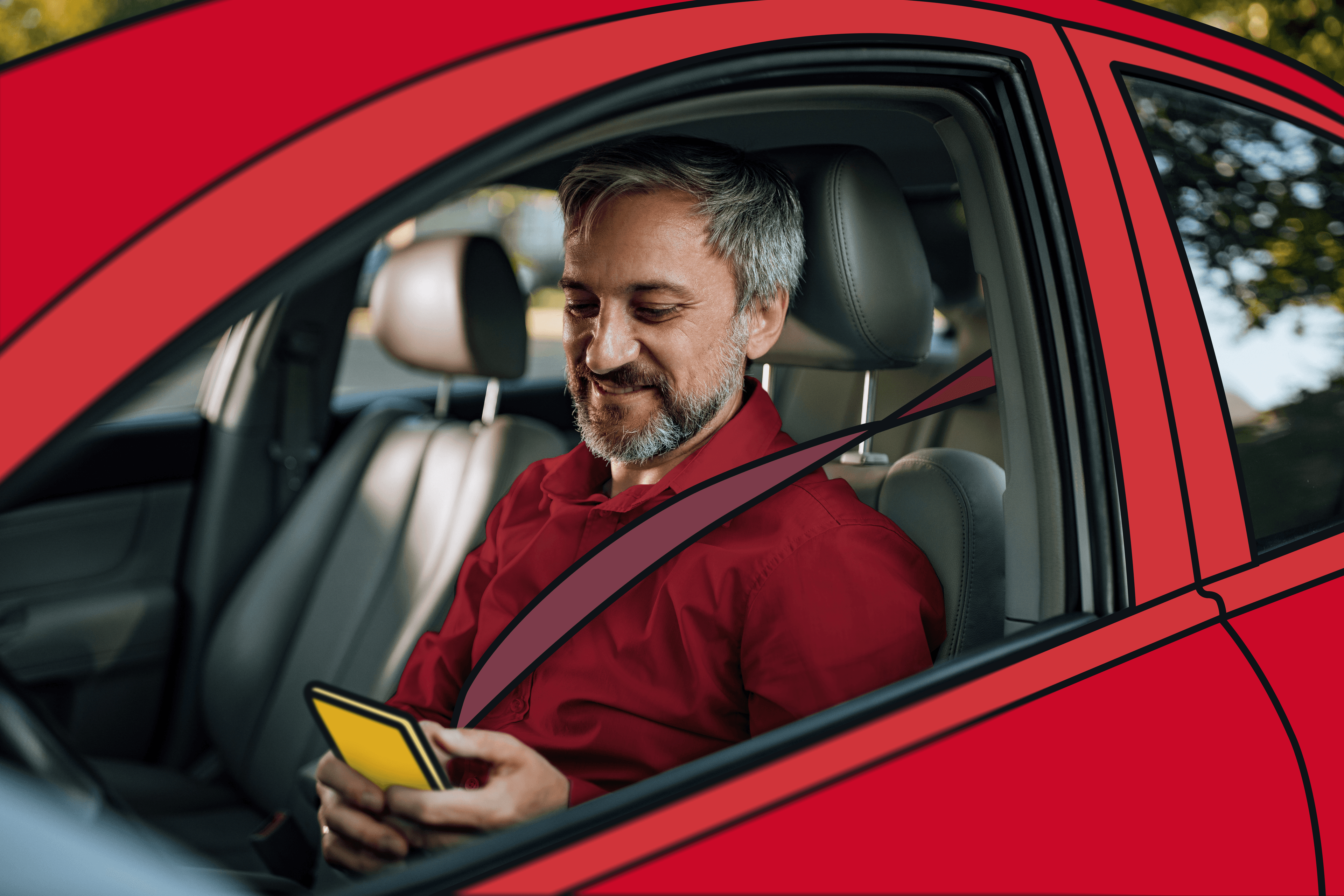 Mitarbeiter sitzt im Auto und schaut auf sein Handy, nachdem er mit seinem FREENOW-Mobilitätsbudget kontaktlos getankt hat