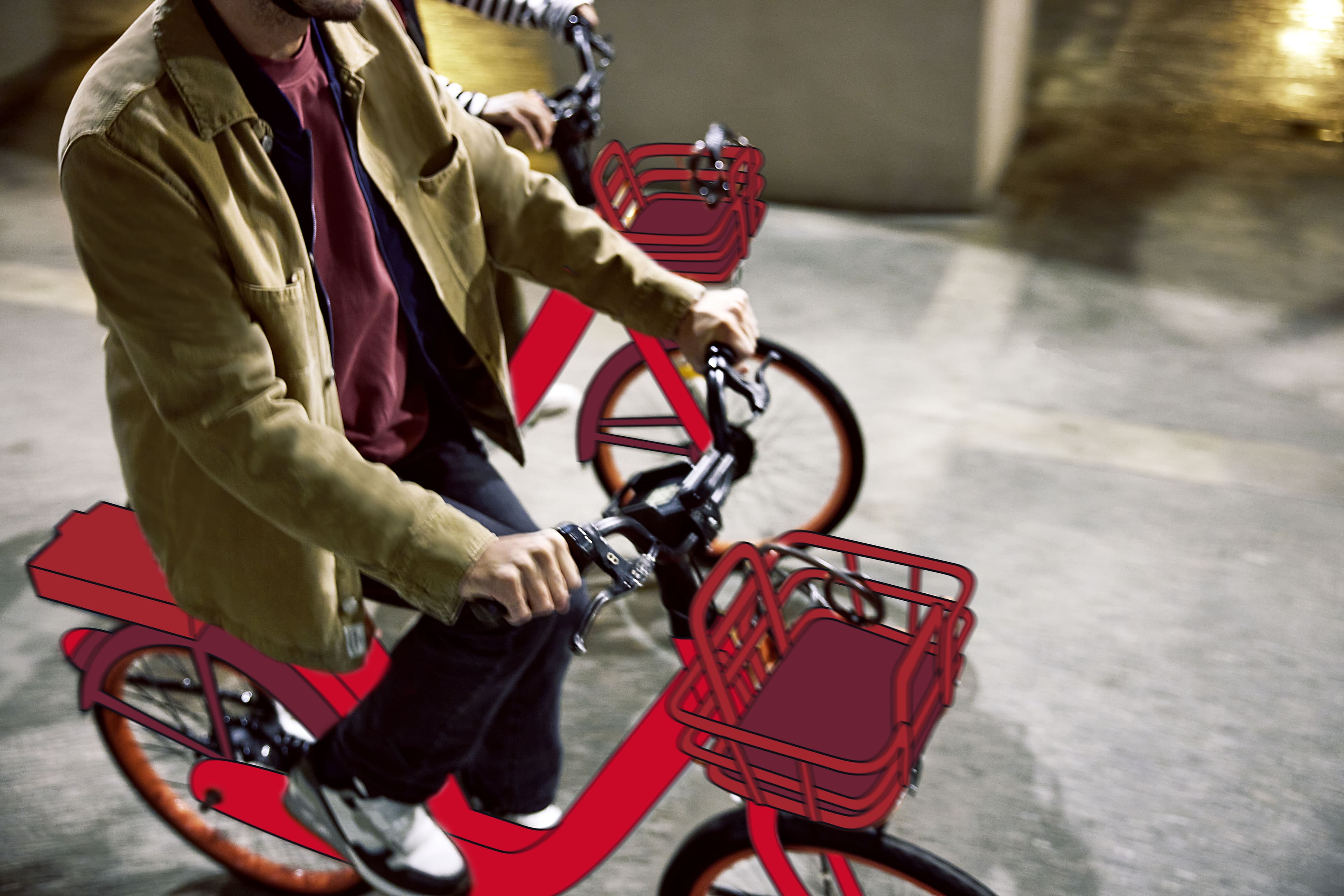 Ein Mitarbeiter, der mit seinem Mobilitätsbudget von FREENOW mit einem roten eBike vom Hauptbahnhof ins Büro fährt