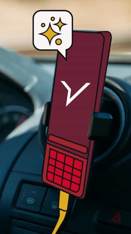 mobile in taxi showing FREENOW logo