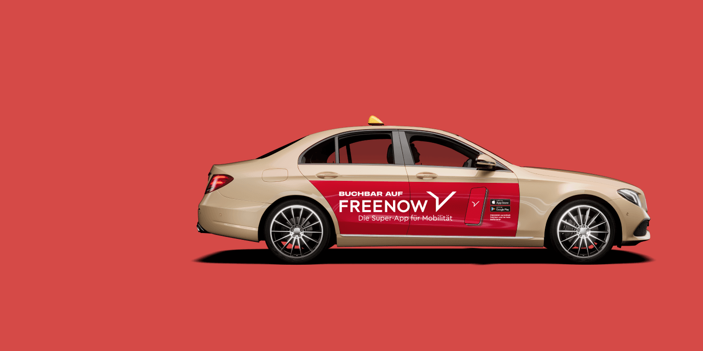 Taxi with FREENOW sticker on doors