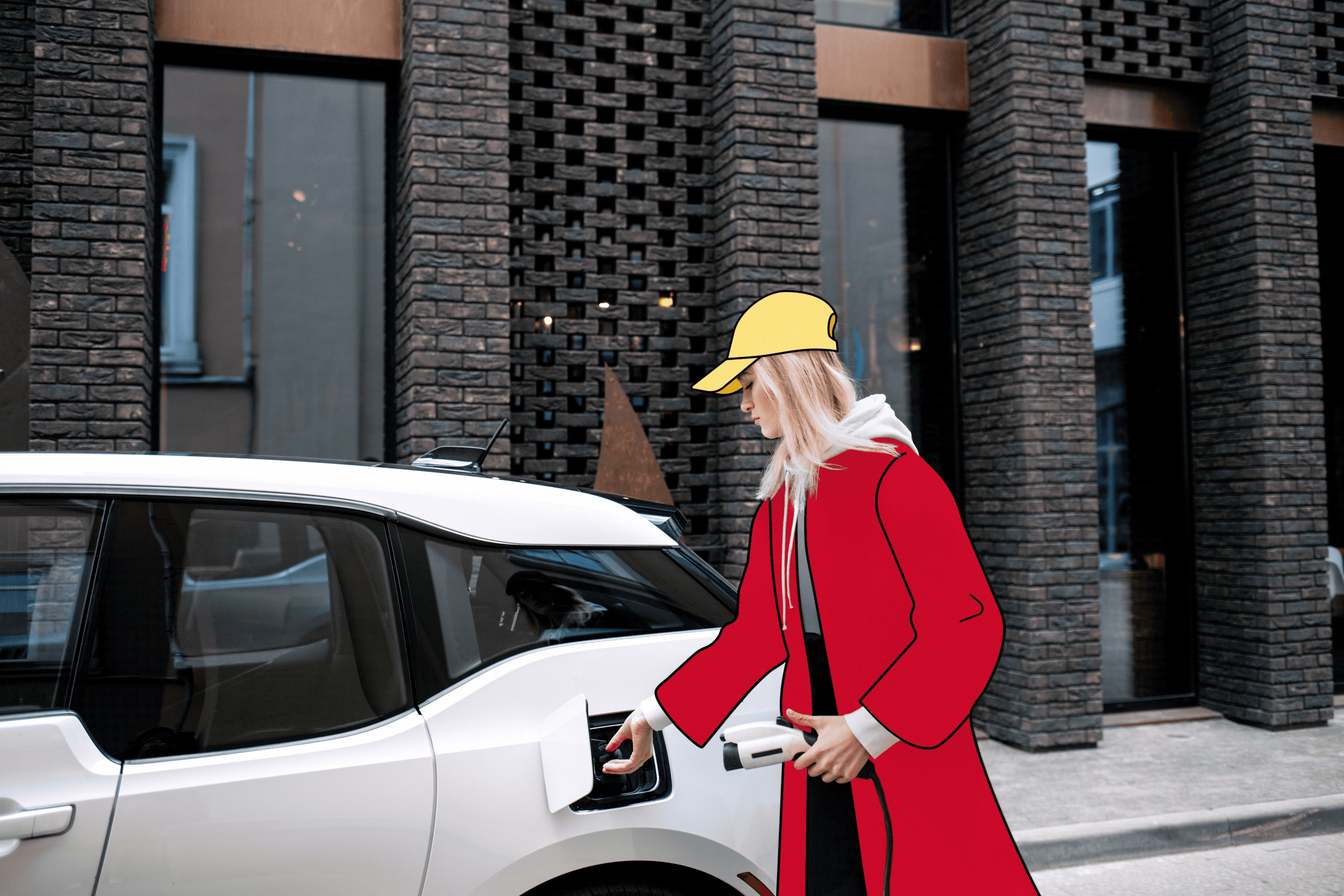 Employee charging her electric vehicle with mobility budget from FREENOW